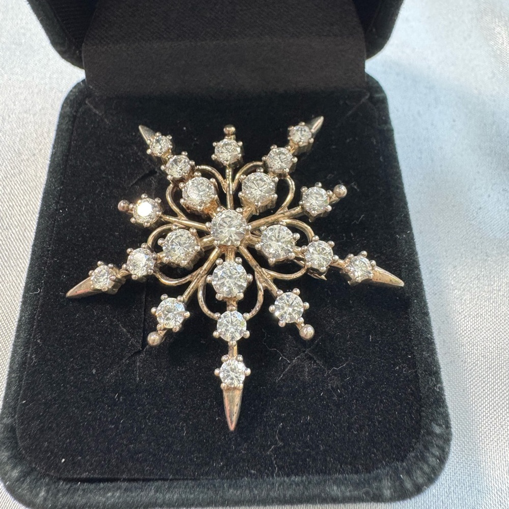 Sterling silver and rhinestone starburst pin